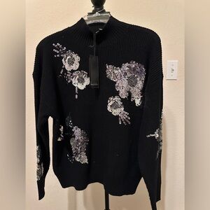 Nicole Miller Black Sweater with Sequin Floral Accents. Size Medium. NWT.
